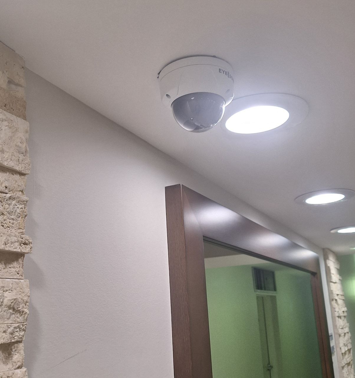 Discreet indoor camera installation in a Calgary home
